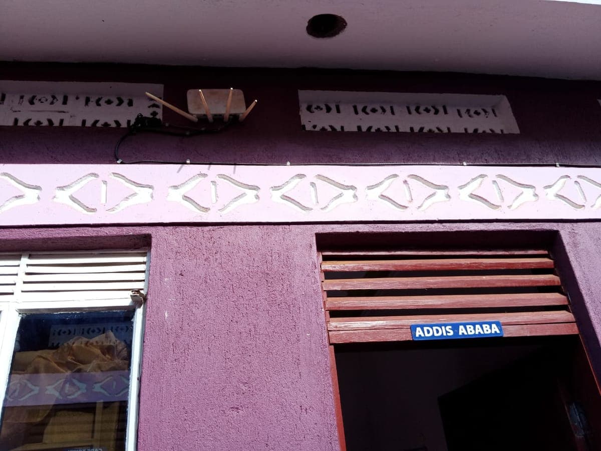 Guest room door named “Addis Ababa”, where each room carries a city name